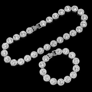 Crystal link chain and bracelet jewelry set with bezel round stones on black background