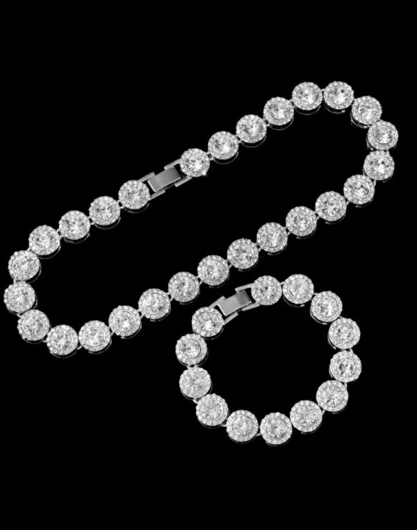 Crystal link chain and bracelet jewelry set with bezel round stones on black background