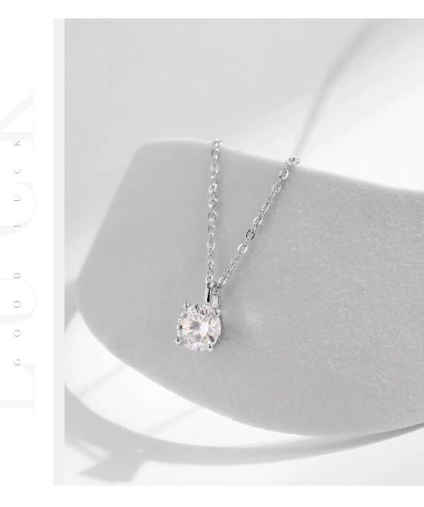 Derin Moissanite Necklace and Stud Earrings Set in sterling silver – displayed on white arch background