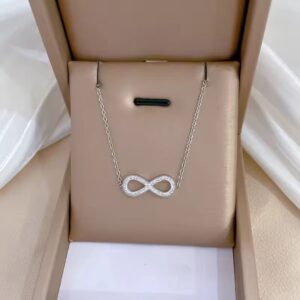 Sterling Silver Infinity Pendant Necklace with crystal accents on a dainty chain – symbolic and elegant design