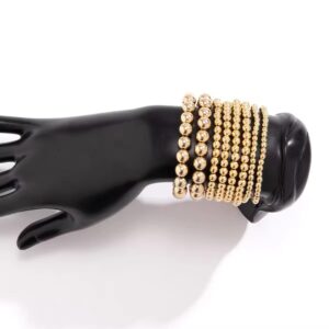Gold-tone stainless steel beaded bracelet set displayed on a black mannequin hand