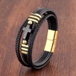 Men’s black leather cross bracelet with gold stainless steel accents and magnetic clasp